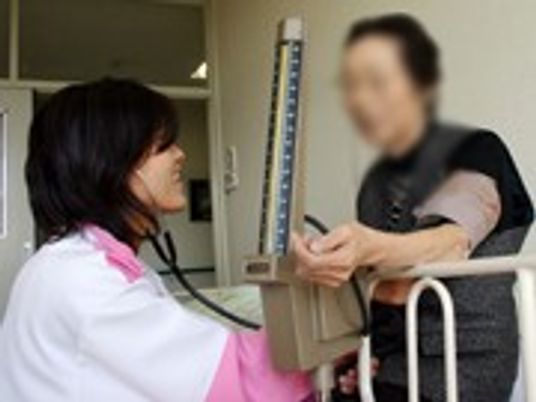健康チェックの場面