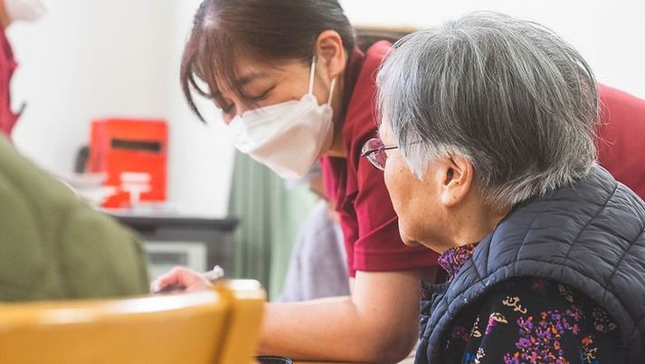 スタッフと話す利用者様