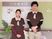 スタッフ二人と案内板