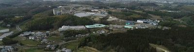 空撮された緑豊かな施設外観