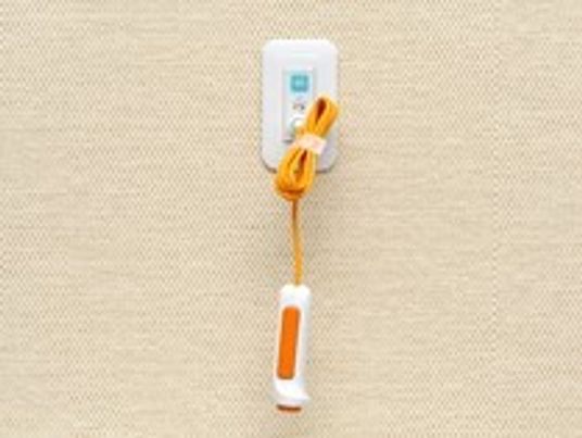 壁に設置された呼び出しボタン