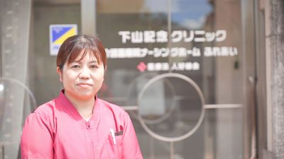 スタッフの様子と看板