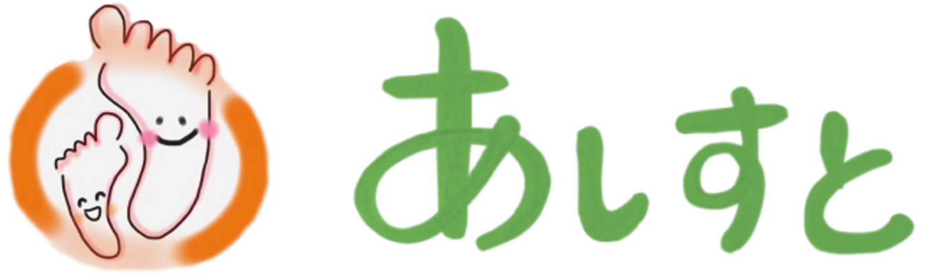 笑顔のロゴ看板  