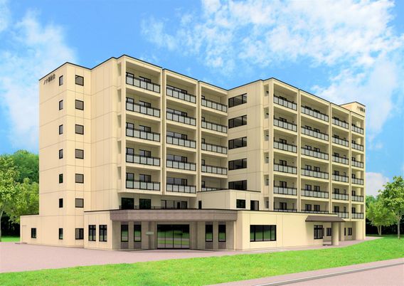 緑に囲まれた建物外観  