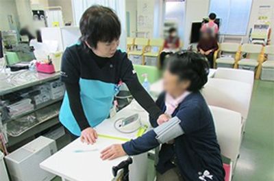 健康チェックの場面