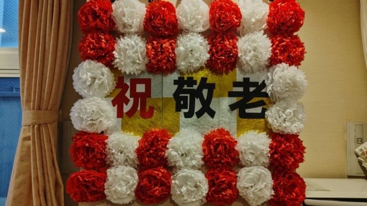 壁掛けの祝い花飾り