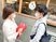 スタッフと来訪者の会話